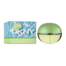 DKNY Be Delicious Lime Mojito Eau de Toilette bottle with green cap beside a blue patterned box