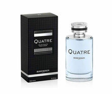 Boucheron Quatre Eau de Toilette for Men two-item set: bottle beside black box with pale blue liquid and silver cap